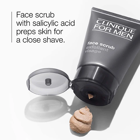 Image 1 - A gray tube of Clinique for Men face scrub with the cap open, showing a small amount of light brown scrub on a white surface, with text that reads Face scrub with salicylic acid preps skin for a close shave.
Image 2 - A close-up view of two petri dishes containing white powders labeled Salicylic acid and Silica, with the Salicylic acid appearing fluffy and scattered while the Silica has a smooth, granular texture.
Image 3 - A beige textured surface with the word exfoliate and a graphic symbol above it.
Image 4 - A table with a gray background listing items that are free of fragrance, gluten, and oil, each marked with a check mark.