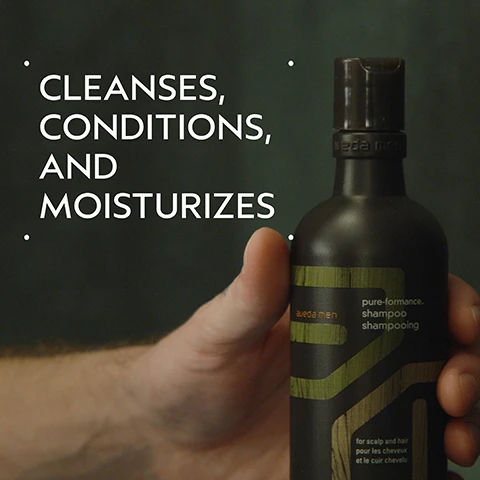 Image 2 - A hand holds a dark bottle of Aveda Men pure-formance shampoo, with large white text on the left side of the image reading CLEANSES, CONDITIONS, AND MOISTURIZES, while the bottle label also states aveda men, pure-formance. shampoo shampooing, for scalp and hair, pour les cheveux et le cuir chevelu. Image 3 - A split image shows a mans hair before and after styling, with his messy hair on the left and neatly combed, shiny hair on the right, accompanied by the text BEFORE, AFTER, Unwashed Hair, and Results with Aveda Men Pure-Formance™ Shampoo, Conditioner, Liquid Pomade, and Grooming Cream. Styled with comb. Image 4 - A hair care guide on a dark green background titled HOW TO USE displays three steps: a man washing his hair with shampoo lather for 01 CLEANSE Aveda Men Pure-Formance™ Shampoo; a hand holding a dark brown Aveda Men Pure-Formance Conditioner bottle, which reads pure-formance conditioner après-shampoo for scalp and hair pour les cheveux et le cuir chevelu 10 fl oz/liq/300 ml e, for 02 CONDITION Aveda Men Pure-Formance™ Conditioner; and tattooed hands rubbing a white styling product for 03 STYLE Aveda Men Pure-Formance™ Liquid Pomade and Grooming Cream. Image 5 - A dollop of translucent light yellow liquid with small bubbles and white foam rests on a white background. Image 6 - A diptych shows a man with unstyled, dark brown hair and light facial stubble on the left, labeled BEFORE Unwashed Hair, and on the right, the same man with neatly styled, lighter brown hair and smoother skin, labeled AFTER Results with Aveda Men Pure-Formance™ Shampoo, Conditioner, and Grooming Clay. Blow dried hair. Image 7 - The image displays a large circular area featuring vibrant green plant-like structures submerged in a clear liquid with bubbles, set against a dark green background, with text that reads: FORMULATED WITHOUT ANIMAL DERIVED INGREDIENTS, MINERAL OIL, SLS, SLES, SYNTHETIC FRAGRANCE, PARABENS, PHTHALATES, PETROLATUM, PARAFFIN, & FORMALDEHYDE DONORS. Image 8 - Dark green tropical leaves and a red plant stem form the background for three white certification logos: a V symbol surrounded by the text 100% VEGAN, a B in a circle accompanied by the text Certified B Corporation, and a leaping rabbit icon with stars followed by the text Cruelty Free INTERNATIONAL.