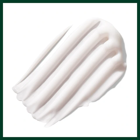 Image 2 - A diagonal smear of thick, glossy white cream with distinct ridges on a white background. Image 3 - A green Aveda pump bottle with a white cap is pictured against a shimmering green-blue background, displaying the embossed text AVEDA on its neck, and on the label AVEDA THE ART AND SCIENCE OF PURE FLOWER AND PLANT ESSENCES, botanical kinetics™, purifying, creme cleanser, crème démaquillante, purifiante, and a flower logo, with large text to its right reading REMOVES SURFACE DIRT AND IMPURITIES. Image 4 - Three Aveda Botanical Kinetics skincare products, including a purifying gel cleanser, a toning mist, and an intense hydrating rich creme, are displayed against a green, sparkling background, with text outlining their usage steps: HOW TO USE 01 CLEANSE Botanical Kinetics Purifying Gel Cleanser 02 TREAT Botanical Kinetics Toning Mist 03 MOISTURIZE Botanical Kinetics Hydrating Rich Crème. Image 5 - Three certification logos are displayed against a dark green leafy background with a hint of red on the left: the first logo on the left shows a large white V surrounded by 100% VEGAN text, the middle logo features a white B inside a circle with Certified Corporation text, and the third logo on the right depicts a white jumping rabbit and three stars with Cruelty Free INTERNATIONAL text below. Image 6 - A dark green image with a central circular abstract green and white texture, featuring white text that reads: FORMULATED WITHOUT ANIMAL DERIVED INGREDIENTS, SILICONES, GLUTEN, MINERAL OIL, SLS/SLES, SYNTHETIC FRAGRANCE, PARABENS, PHTHALATES, PETROLATUM, PARAFFIN, & FORMALDEHYDE DONORS.