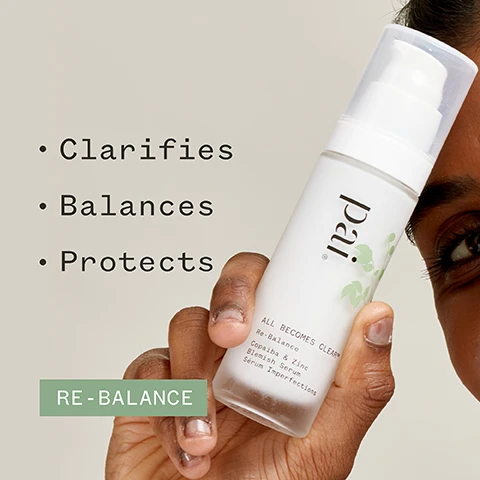 Image 1 - A person is holding a bottle of Pai Re-Balance Blemish Serum with a light background, next to text that reads Clarifies, Balances, Protects, and RE-BALANCE.
Image 2 - A person holds a white serum bottle labeled pai All Becomes Clear Re-Balance Zinc Blemish Serum while the text nearby states Reduces sebum production by up to 65%* along with certification icons for organic and vegan standards.