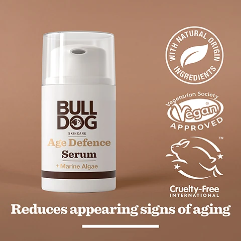 Image 2 - A white bottle with a pump contains Bulldog Age Defence Serum, featuring a label that includes the text BULL DOG SKINCARE Age Defence Serum + Marine Algae and additional symbols indicating vegan, cruelty-free, and natural ingredients, along with the phrase Reduces appearing signs of aging.
Image 3 - Close-up of green powdered algae with text that states 97% Natural Origin, Unlock the true potential of natural origin ingredients, Marine Algae.
Image 4 - A person holds a white skincare serum bottle labeled BULLDOG Age Defence Serum above an open palm, with the text Mature Skin visible at the bottom.
Image 5 - A skincare product, Bulldog Age Defence Serum, is displayed on a surface, with visible text reading Reduce the appearance of fine lines and wrinkles.
Image 6 - A hand holds a container of Bulldog skincare serum next to a Bulldog age defense eye roll-on and moisturizer on a countertop, with the text Reduce the appearance of fine lines and wrinkles displayed below the products.