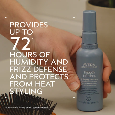 Image 2 - A hand holds a light blue Aveda product bottle against a blurred background, with a hairbrush visible in the bottom left, displaying promotional text: PROVIDES UP TO 72* HOURS OF HUMIDITY AND FRIZZ DEFENSE AND PROTECTS FROM HEAT STYLING, followed by a footnote *Laboratory testing on frizz-prone tresses, and the bottle itself shows AVEDA THE ART AND SCIENCE OF PURE FLOWER AND PLANT ESSENCES smooth infusion™ style-prep smoother™ plant-powered frizz control leave-in treatment serum pre-style heat protection contrôle les frisottis grâce au pouvoir des plantes sérum traitant sans rinçage protection thermique avant coiffage 3.4 fl oz/oz liq/100 ml e. Image 3 - A split image shows a woman with shoulder-length brown hair with reddish ends; the left side, labeled BEFORE, shows her hair appearing straight and unwashed, while the right side, labeled AFTER, shows her hair styled in soft waves, with additional text Unwashed Hair, and Results with Shampure Nurturing Shampoo and Conditioner, Smooth Infusion Style-Prep Smoother, Control Paste and Control Force. Blow dried hair. Image 4 - A dark green image features a circular close-up of a halved avocado seed submerged in golden oil with dark streaks, accompanied by the text: BOTANICAL SMOOTHING BLEND FEATURES KALAHARI MELON AND TAMANU SEED OILS TO SMOOTH AND CONDITION CUTICLES FOR SOFTNESS AND SHINE. Image 5 - A white dollop of cream or lotion with a soft peak is shown against a pure white background. Image 6 - A four-step hair care routine is displayed on a dark green background with circular images for each step: first, a person shampooing their hair; second, conditioner being dispensed into a hand; third, a hand holding a styling prep spray bottle; and fourth, a hand holding a hairspray can, with text that reads: HOW TO USE 01 CLEANSE Shampure Nurturing Shampoo 02 CONDITION Shampure Nurturing Conditioner 03 PREP Smooth Infusion Style-Prep Smoother 04 STYLE Control Paste and Control Force. Image 7 - Three white certification logos are displayed on a dark green leafy background with a red plant, reading 100% VEGAN V 100% VEGAN, Certified B Corporation, and Cruelty Free INTERNATIONAL.