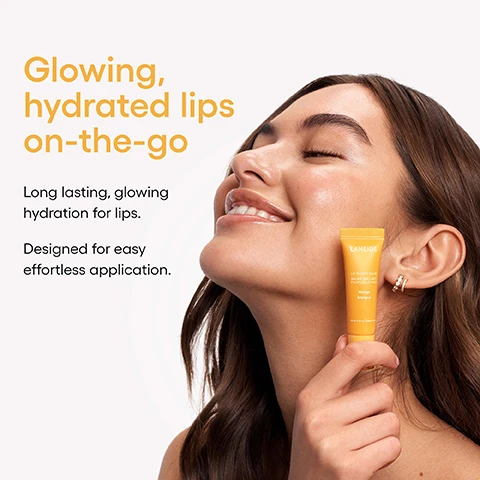 Image 1 - A woman with glowing skin and hydrated lips smiles upwards, holding a yellow tube of LANEIGE Lip Glowy Balm in Mango, with text overlay that reads Glowing, hydrated lips on-the-go. Long lasting, glowing hydration for lips. Designed for easy effortless application. The product also says Baume Brillant Pour Les Lèvres, Mangue, and Net Wt. 0.35 oz. / Poids net 10 g. Image 2 - A yellow tube of Laneige Lip Glowy Balm in Mango flavor, surrounded by mango fruit pieces and a swirl of balm, with all visible text reading Lips as smooth as butter. Infused with two blends of butter for the smoothness your lips crave. Shea Butter to nourish. Murumuru Seed Butter to hydrate. LANEIGE LIP GLOWY BALM BAUME BRILLANT POUR LES LÈVRES Mango Mangue Net Wt. 0.35 oz. / Poids net 10 g. Image 3 - The image shows several bright yellow mango slices scattered on a white background, accompanied by text that reads BUTTER UP, THEN PUCKER UP! After 1 Week of Use, followed by four yellow circles with survey results: 98% Agreed lips look glossy & feel smoother, 96% Agreed lips feel nourished, 94% Agreed lips feel well-hydrated, and 92% Agreed lips look less flaky. Image 4 - The image displays an arrangement of several colorful lip gloss tubes in shades of purple, pink, yellow, red, and cream, each with a clear applicator top and a visible dab of gloss, accompanied by the text Glossing 10 million* lips worldwide! and *Period: 2017 - 2023.