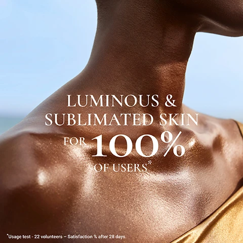 Image 1 - A close-up of a persons neck and shoulder showcasing glowing, radiant skin with the text LUMINOUS & SUBLIMATED SKIN FOR 100% OF USERS* below it.
Image 2 - A shimmering golden abstract background with the text 100% NATURAL ORIGIN PEARLY PARTICLES.