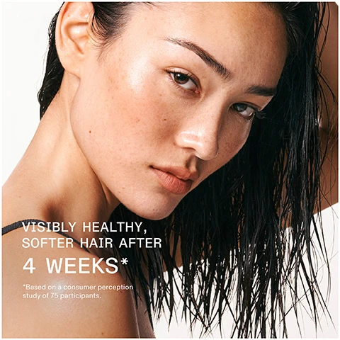 Image 1 - A close-up image of a woman with wet hair and a natural look, showing her smooth skin and confident expression, with the text VISIBLY HEALTHY, SOFTER HAIR AFTER 4 WEEKS* *Based on a consumer perception study of 75 participants.
Image 2 - A close-up of a person’s scalp with a serum applicator dispensing product, accompanied by the text PROTECTS AGAINST ACCELERATED SCALP AGING AND PROMOTES SOFT, VISIBLY HEALTHIER HAIR.